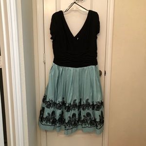 Black and teal dress with black flowers